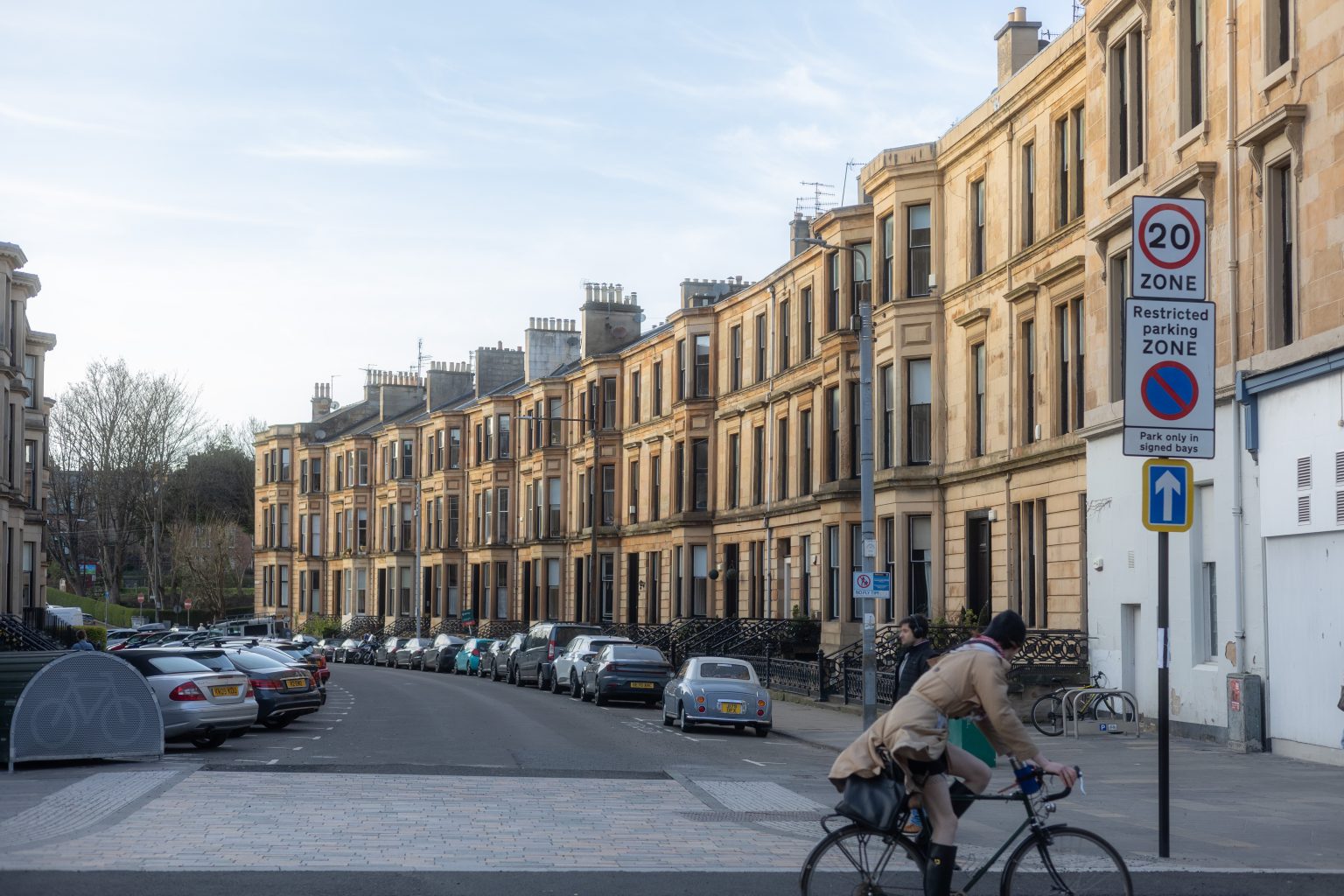 Dowanside Road, Dowanhill, Glasgow cars, blue sky and cyclist