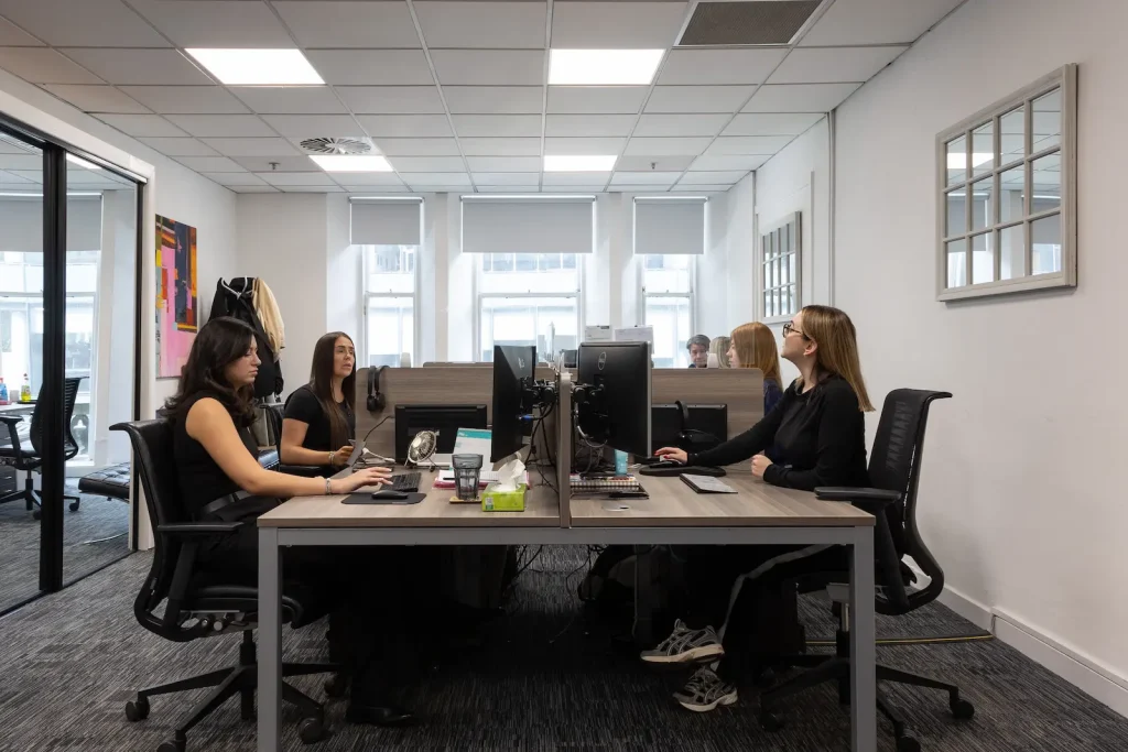 Infiniti Properties team working at their desks in the Glasgow office